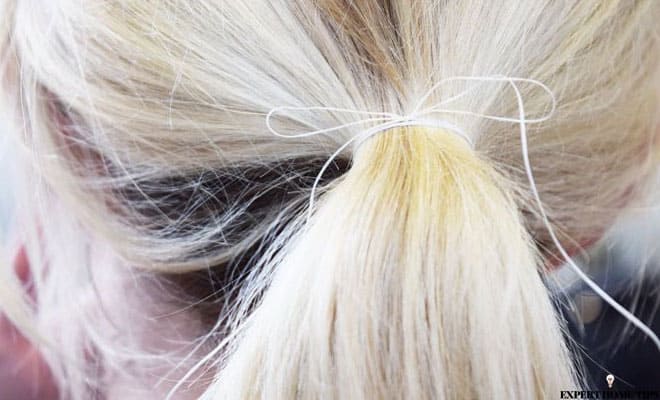 Floss tied in girl’s hair 