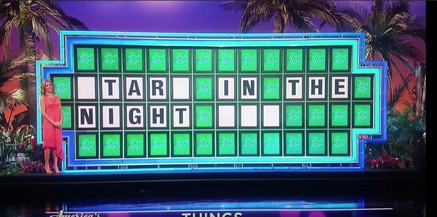 Wheel of Fortune puzzle reading “_TAR_ IN THE NIGHT _ _ _”