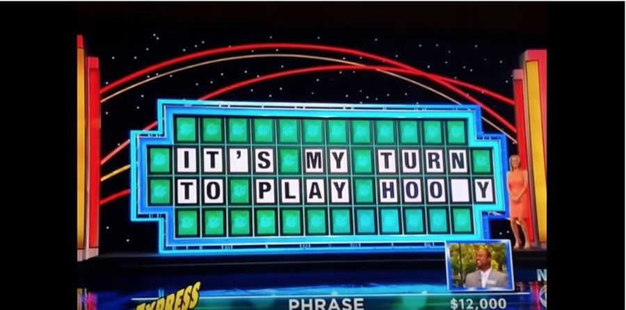 Wheel of Fortune puzzle reading “IT’S MY TURN TO PLAY HOO_Y”