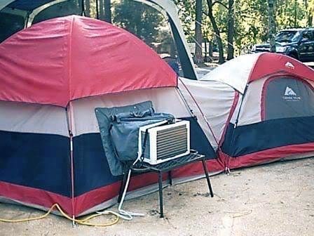 tent with an air conditioner installed in the window 