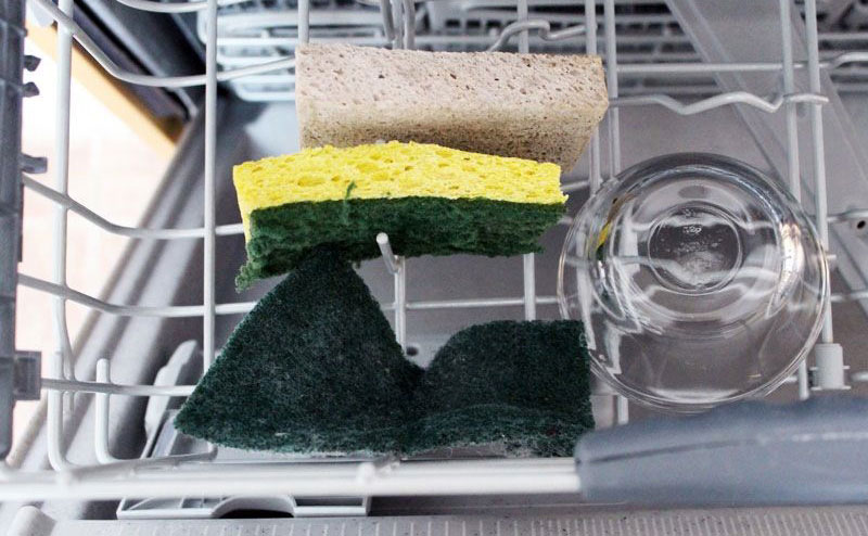 Kitchen sponges inside of the dishwasher 