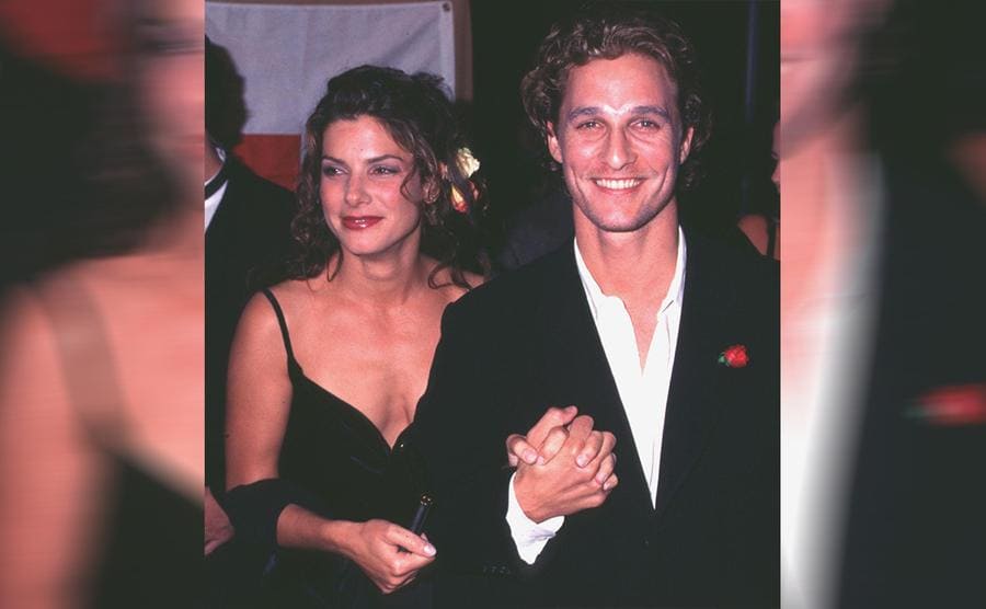 Sandra Bullock and Matthew McConaughey on the red carpet in 1997