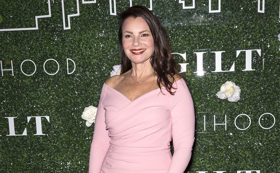 Fran Dresher in a pink dress on the red carpet in 2017