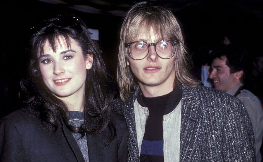 Demi Moore and Freddie Moore at an event in 1982