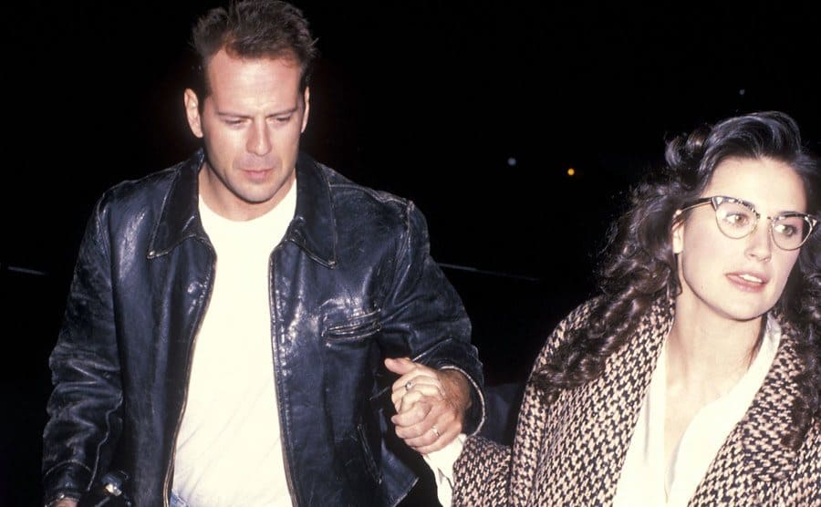 Bruce Willis and Demi Moore arriving to an event in 1988 
