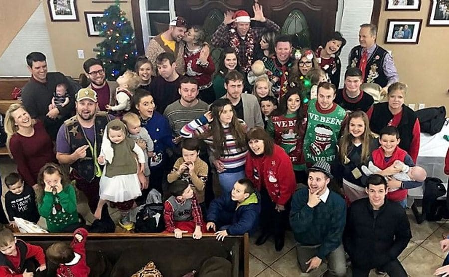 The entire Duggar family at home celebrating Christmas with an ugly sweater party 