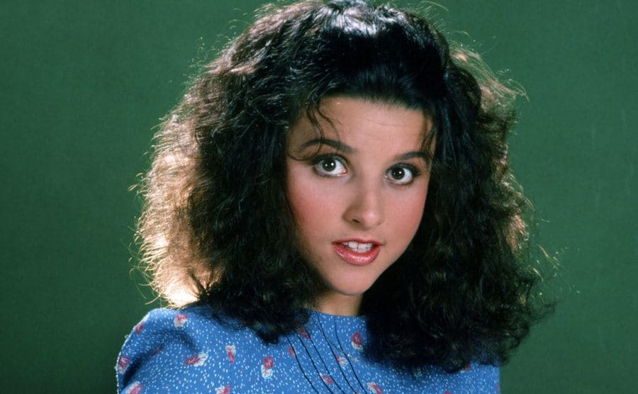 Julia Louis-Dreyfus posing for a promotional photograph for Saturday Night Live 