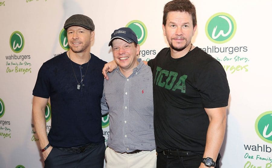 Donnie, Paul, and Mark Wahlberg on the red carpet 