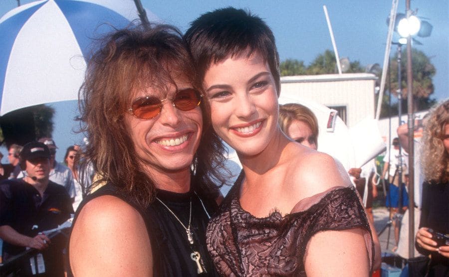 American singer-songwriter Steven Tyler and his daughter Liv Tyler pose for a portrait circa 1993.