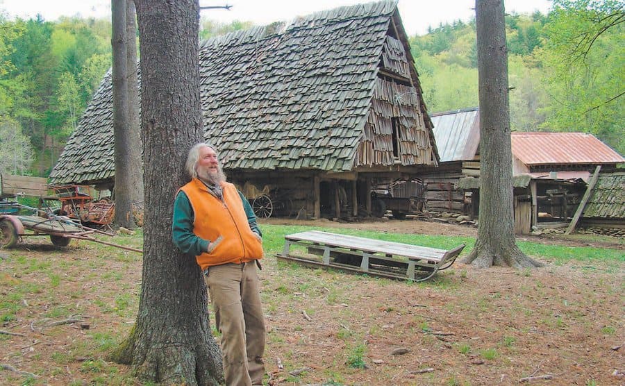 Eustace leaning on a tree outside The Turtle Island Preserve.