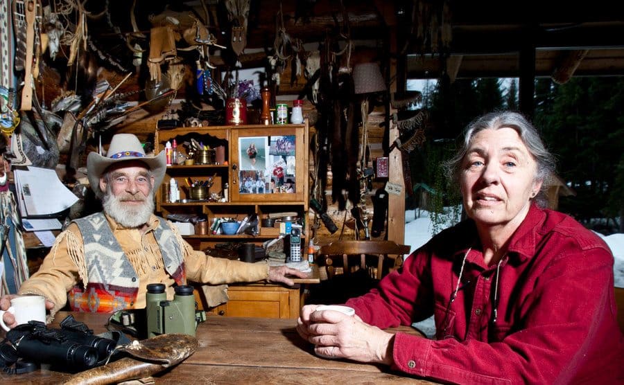 Tom Oar and his wife, Nancy, relax in their humble mountain house.