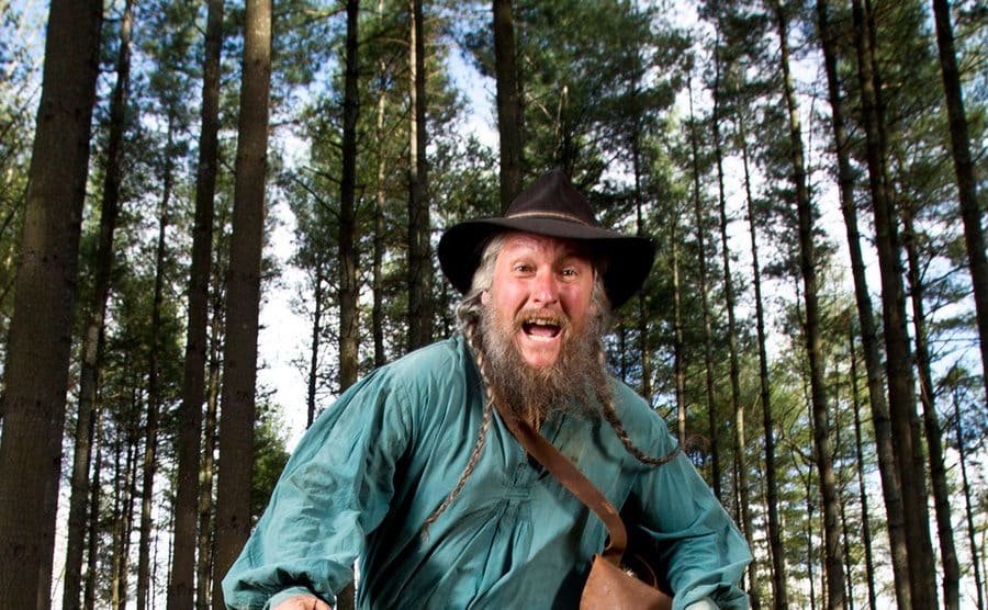 Eustace running through the woods.