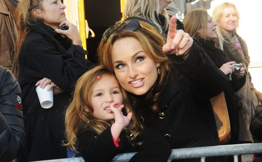 Giada pointing something out to Jade at the Macy’s Thanksgiving day parade 