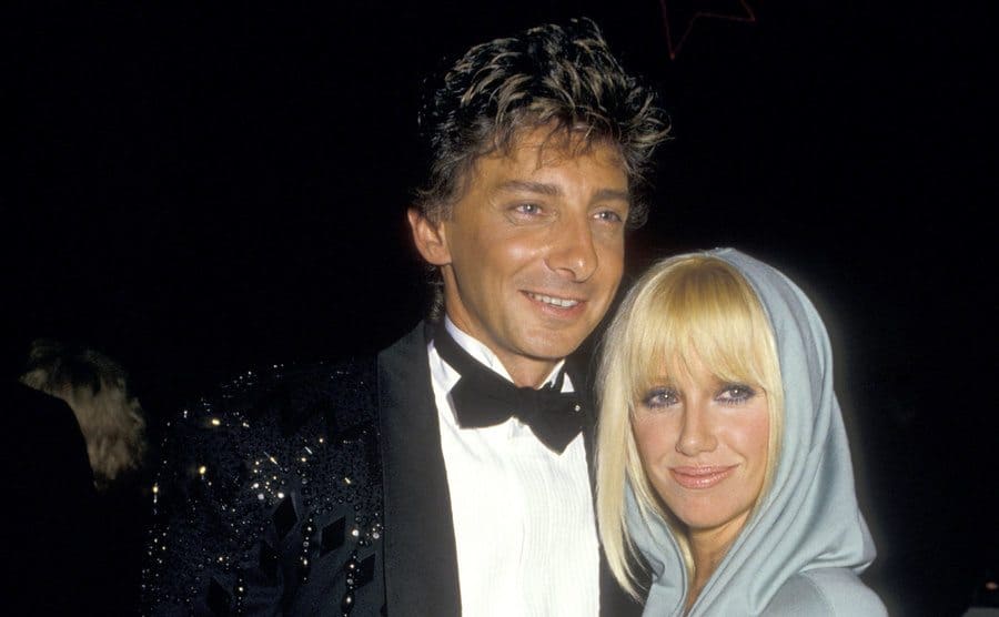 Barry Manilow and Suzanne Somers arriving at an event 