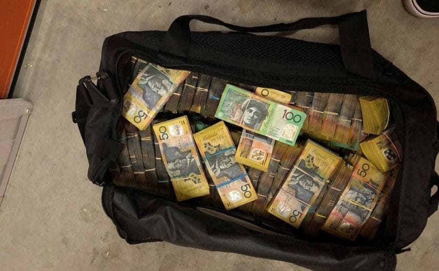 A duffle bag filled with cash. 