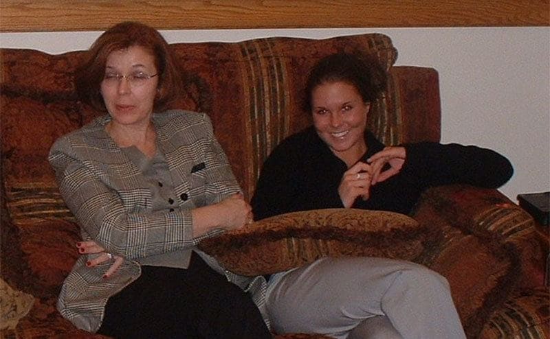 Maura with Sharon Rausch in Ohio sitting on a couch. 