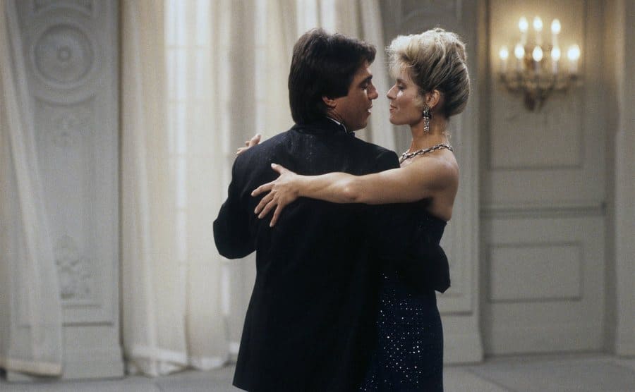 Tony Danza and Judith Light are dancing in a ballroom in a scene from “Who’s the Boss?”.