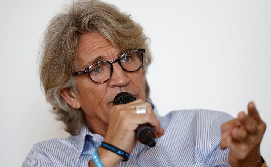 Eric Roberts holds a press conference. 