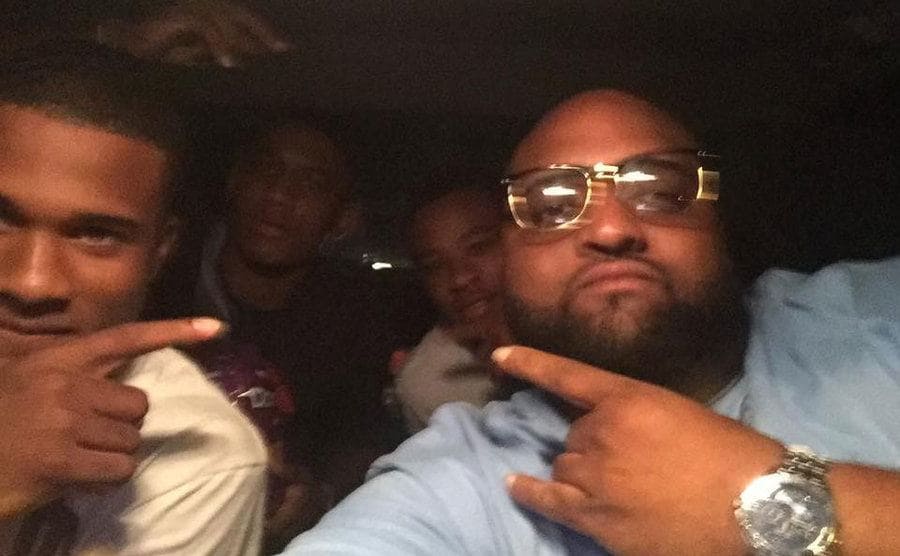 Rhett Peters takes a selfie with his friends inside his car. 