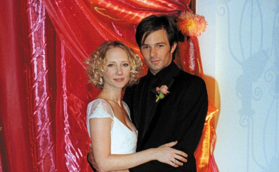 Anne Heche poses with her husband Coley Laffoon on their wedding day. 