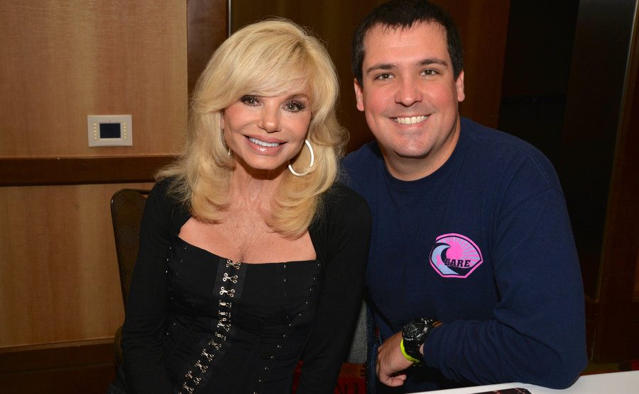 Loni Anderson and her son Quinton smile at the camera. 