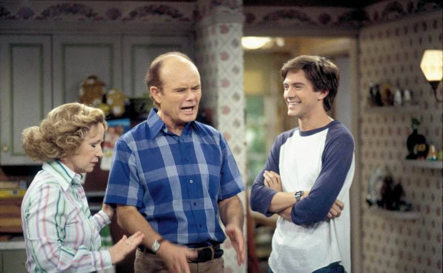 Kurtwood Smith, Debra Jo Rupp, and Topher Grace in a family scene from the show. 