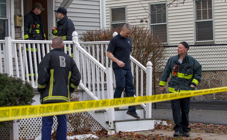 First responders tape off a house that has an apparent carbon monoxide leak.