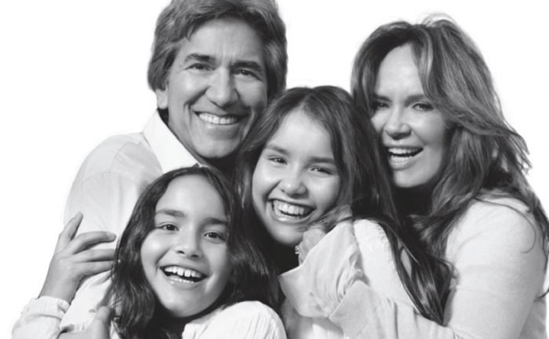 A studio portrait for Catherine Bach, Peter Lopez, and their daughters. 