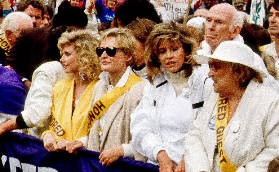 Fairchild marches next to Susan Sarandon, Gloria Allred, Gloria Steine, and other celebrities.