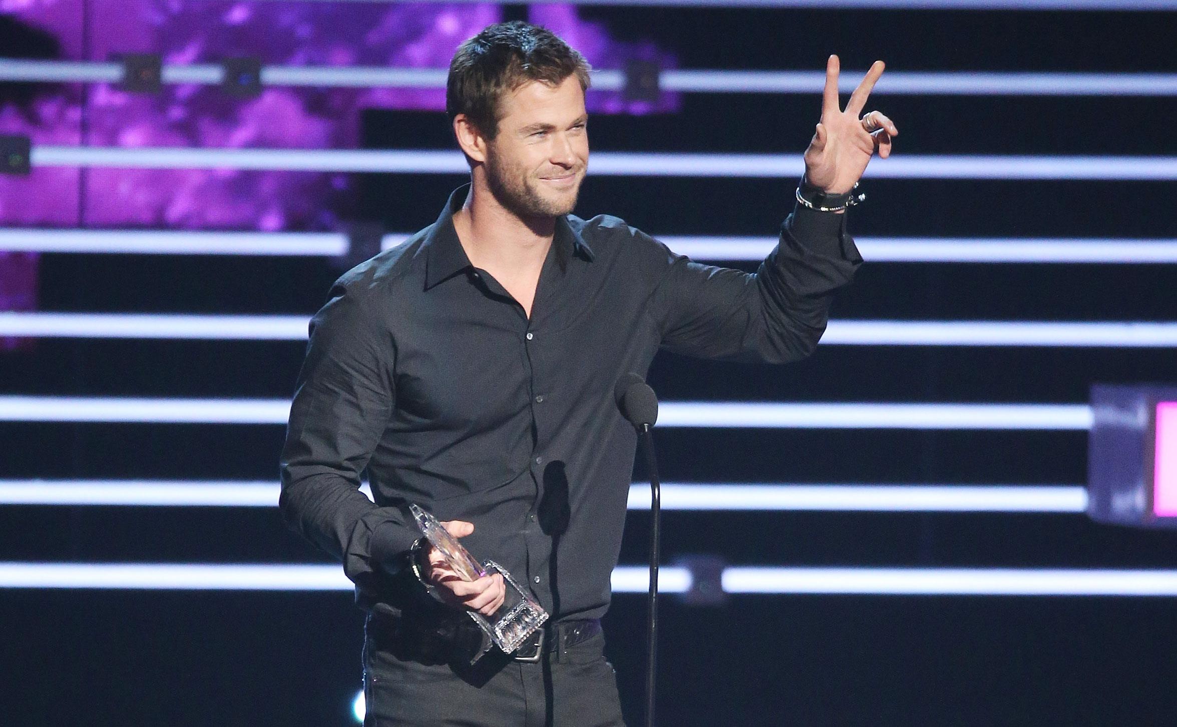 Chris speaks on stage at the People's Choice Award.