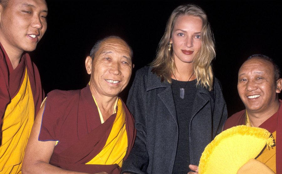 A photo of Uma Thurman and Ganden Shartse Monks.