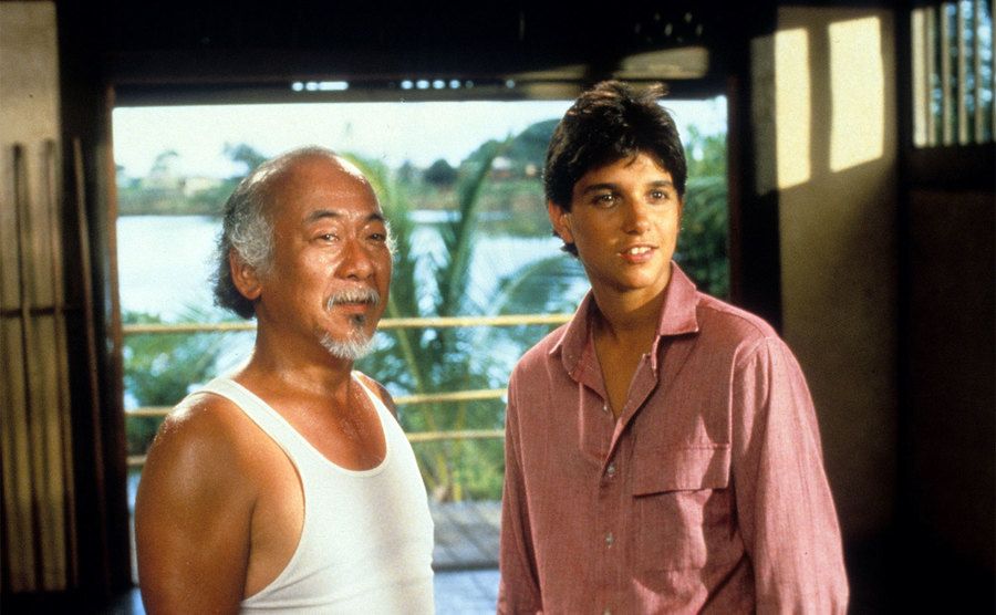 Pat Morita and Ralph Macchio in a scene from the film 'The Karate Kid,' 1984.