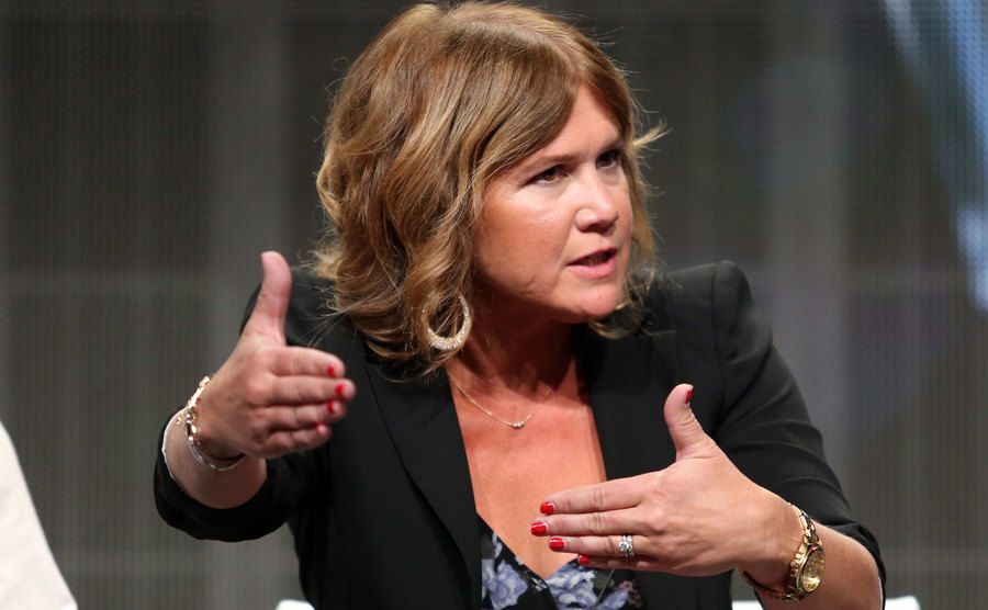 Tracey Gold speaks on stage.