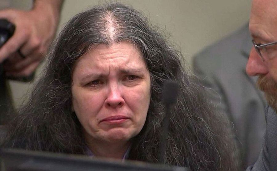 A photo of Louise crying in court.