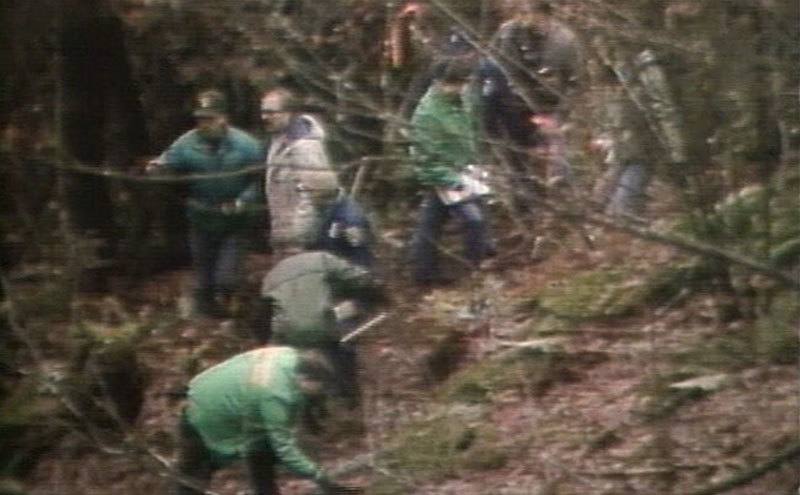 Police search the woods for evidence to incriminate Gary.