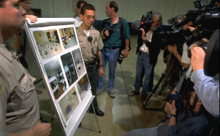 Police officers share the cult photos with the media.