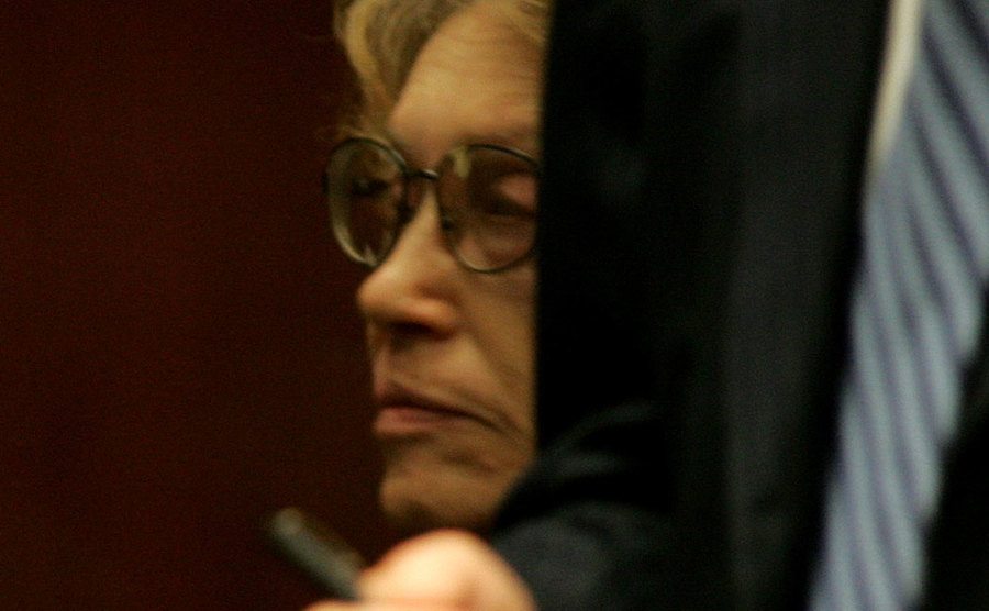 A close-up on Helen Golay as she sits in court.