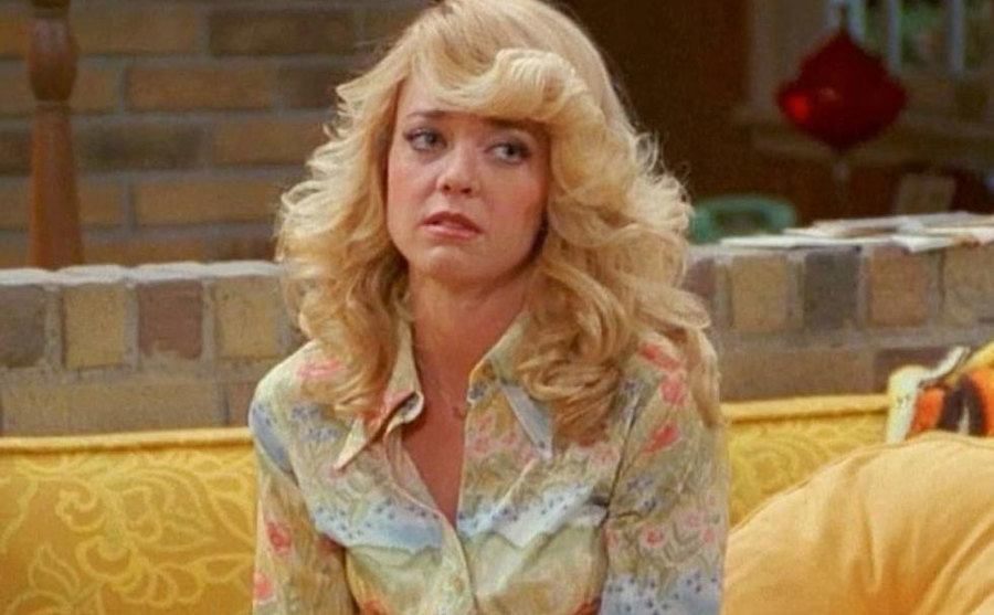 Lisa Robin Kelly is in a still of That ‘70s Show.