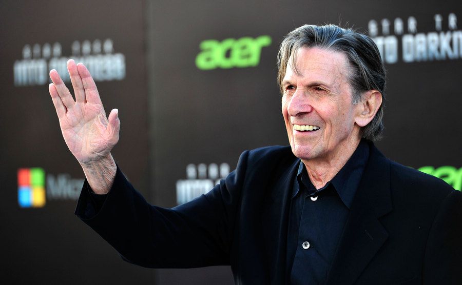 A picture of Leonard Nimoy posing for the press.