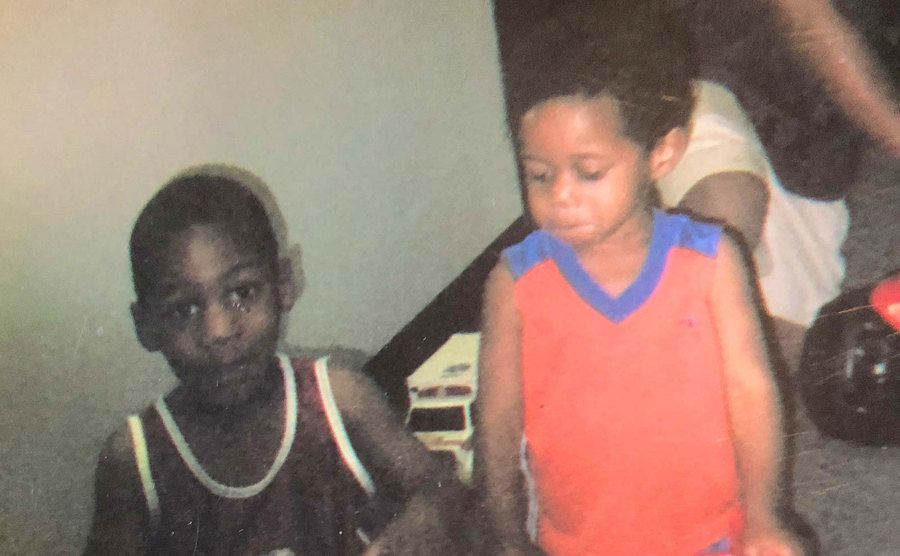 A dated photo of Devonte and Jeremiah before their adoption.