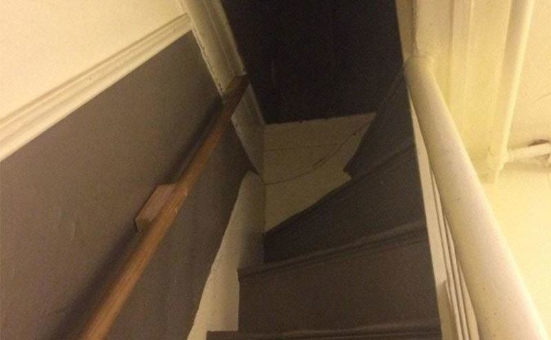 A photo of the staircase leading to the attic.