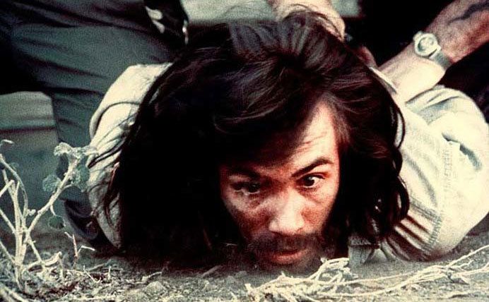 A still of Steve Railsback as Charles Manson getting arrested.