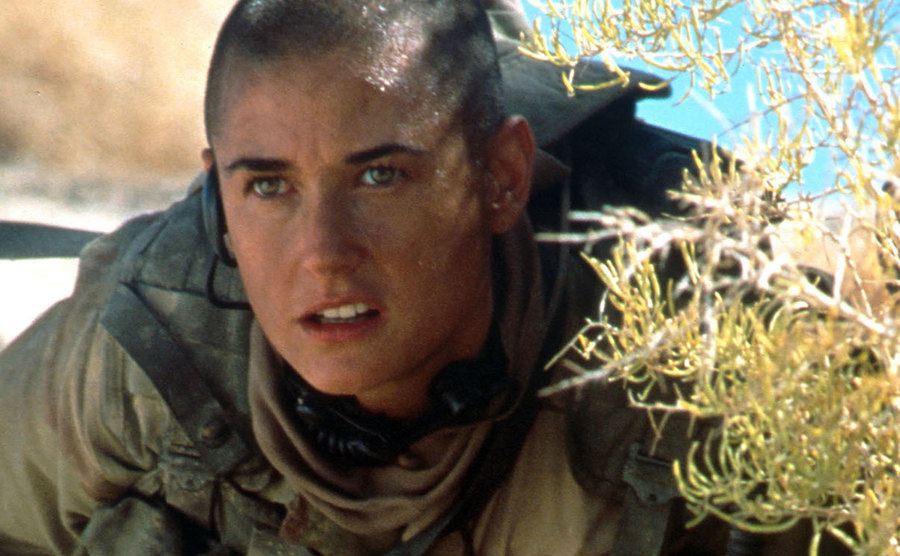 A still of Demi Moore in a scene on the battlefield.