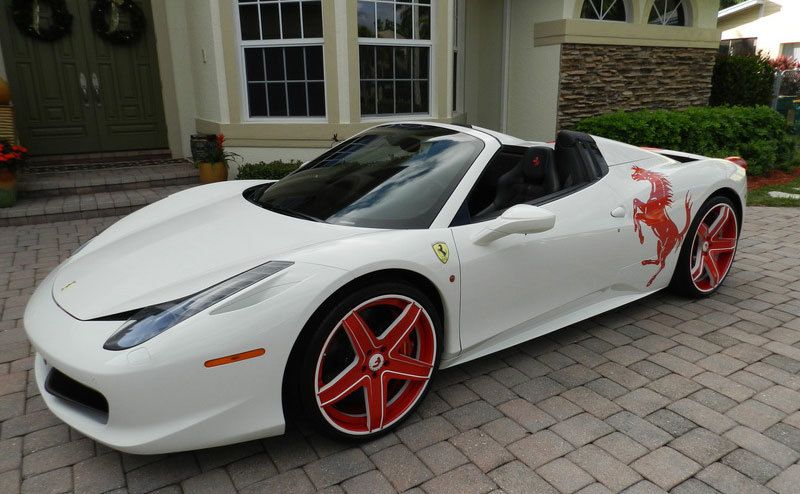 Julio Jones’ Ferrari 458 Spider is parked outside his home. 