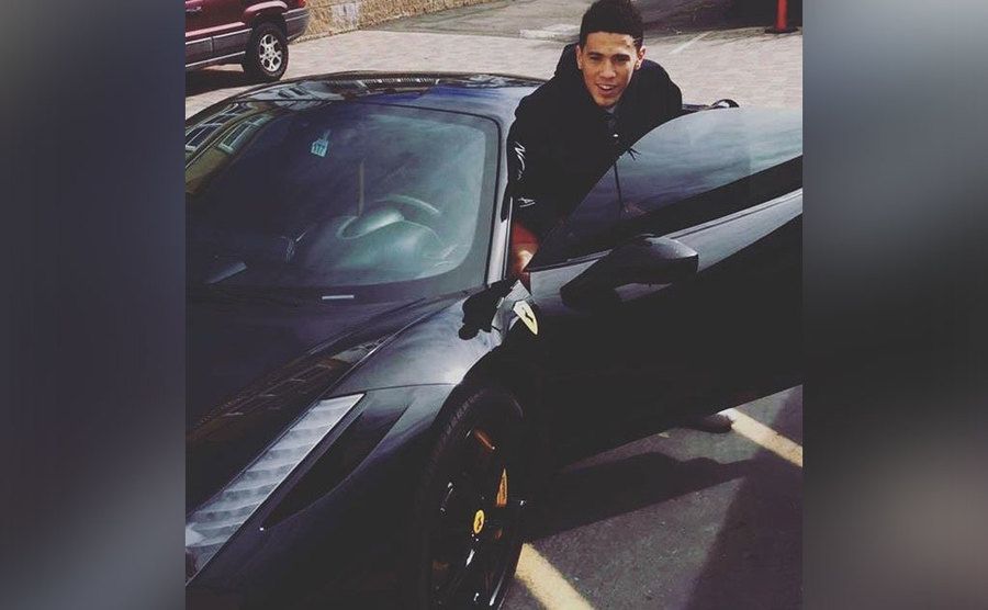 Devin Booker steps out of his Ferrari 488 Spider