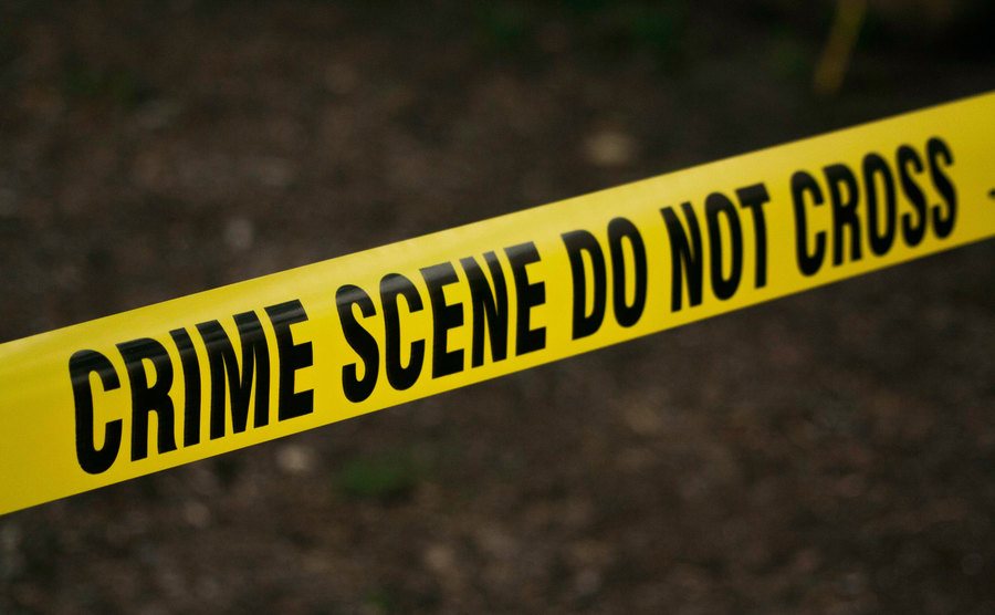 An image of a police tape marking a crime scene.