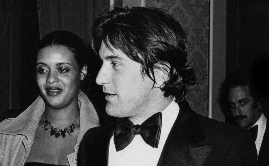 A dated picture of Diahnne Abbott and De Niro attending an event.