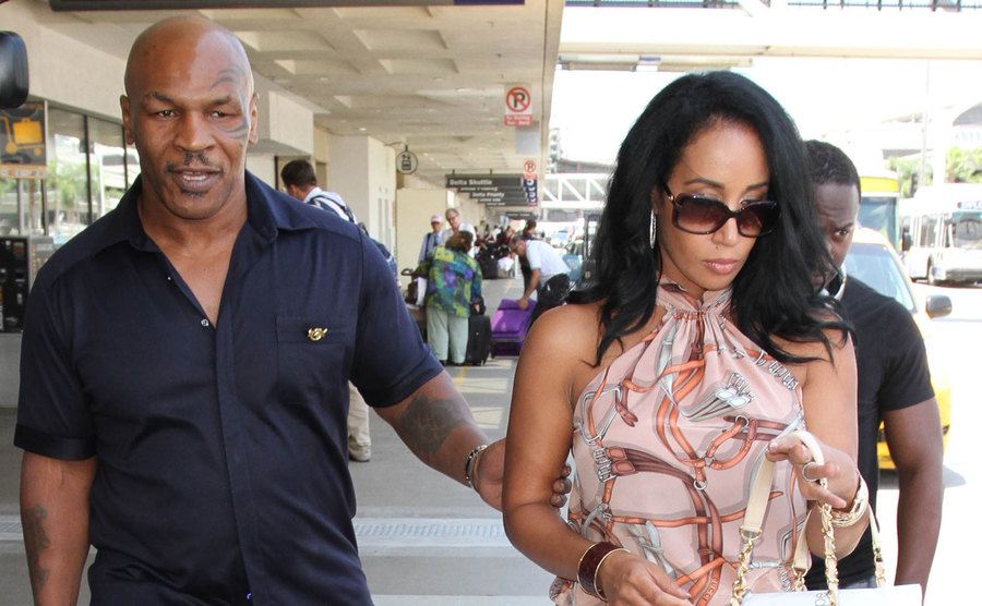 A photo of Tyson and his wife at the airport.