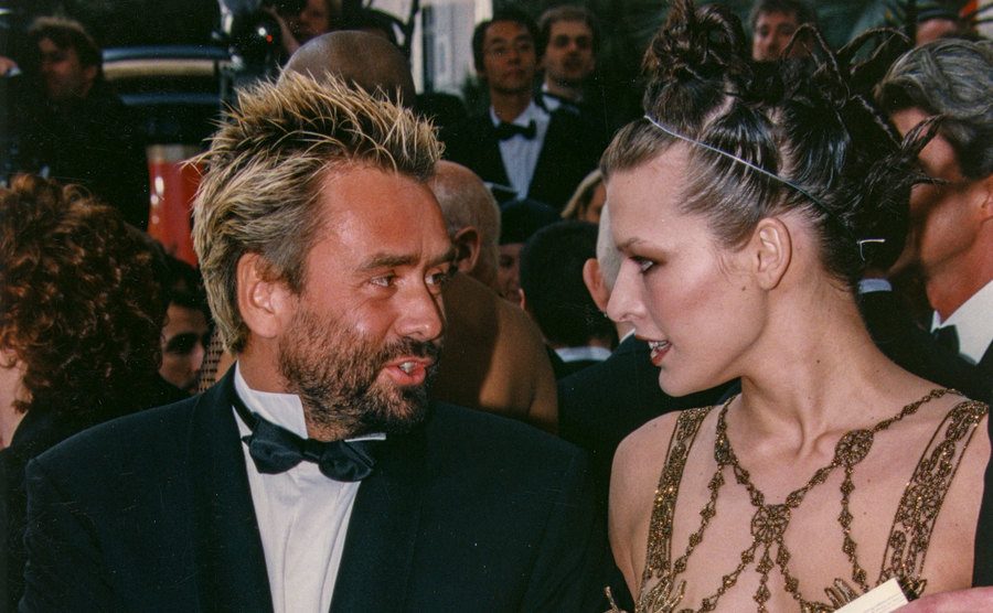 Luc Besson and Jovovich attend an event.