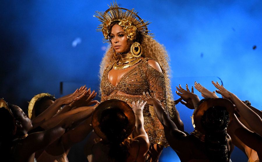 Beyoncé performs on stage.